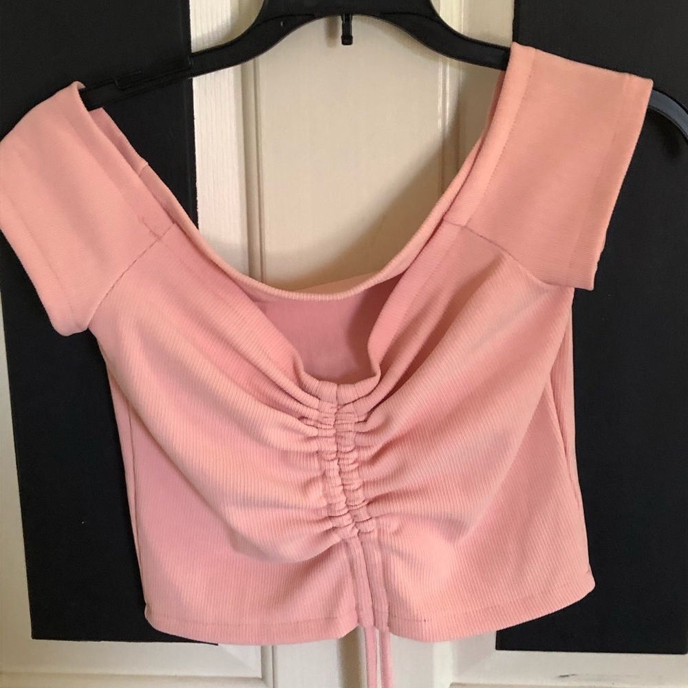 pink off the shoulder tie shirt
